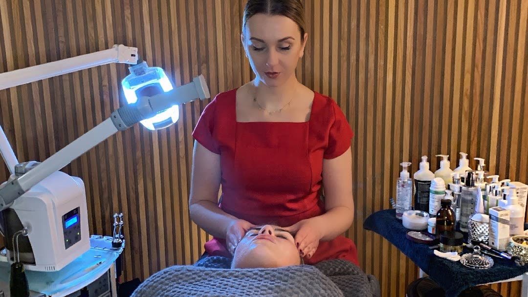 Patrycja carrying out a facial treatment at the Cheltenham studio