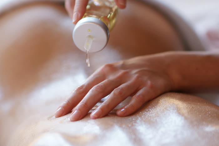 Aromatherapy oils and calming treatment setting for a massage in Cheltenham