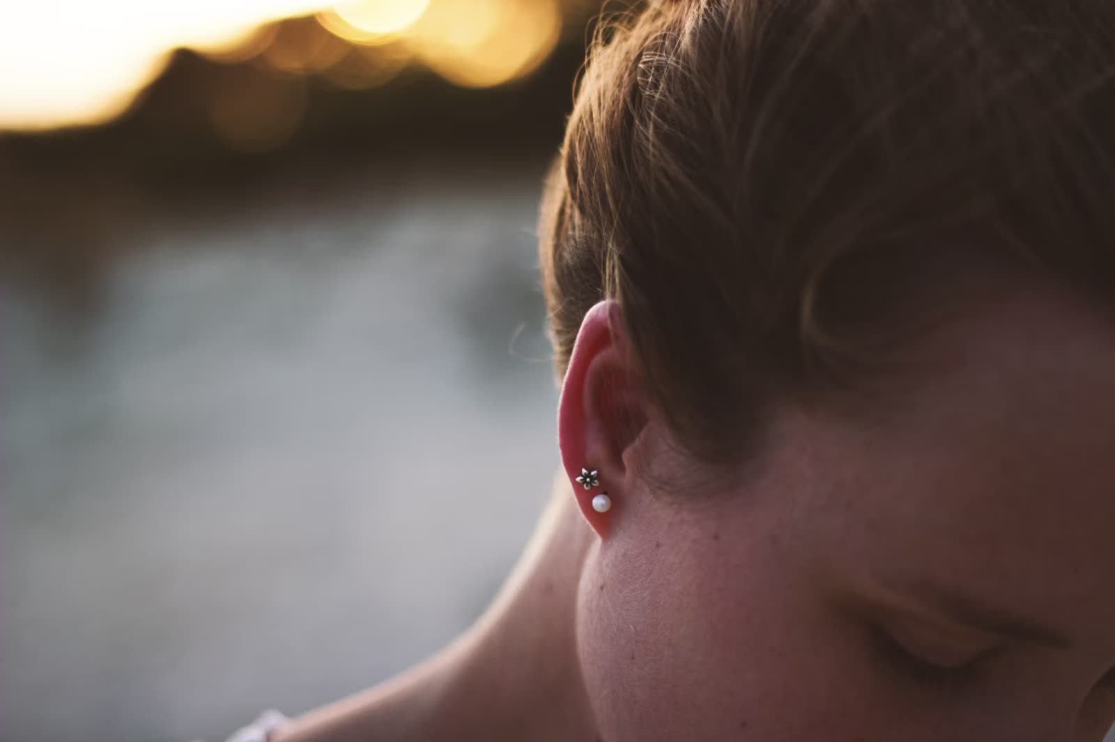 Professional ear piercing service being carried out in Cheltenham, close up