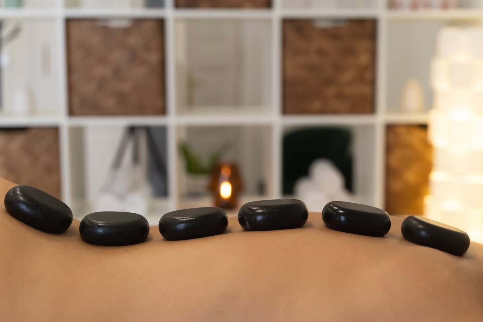 Hot stones used for massage treatment in Cheltenham