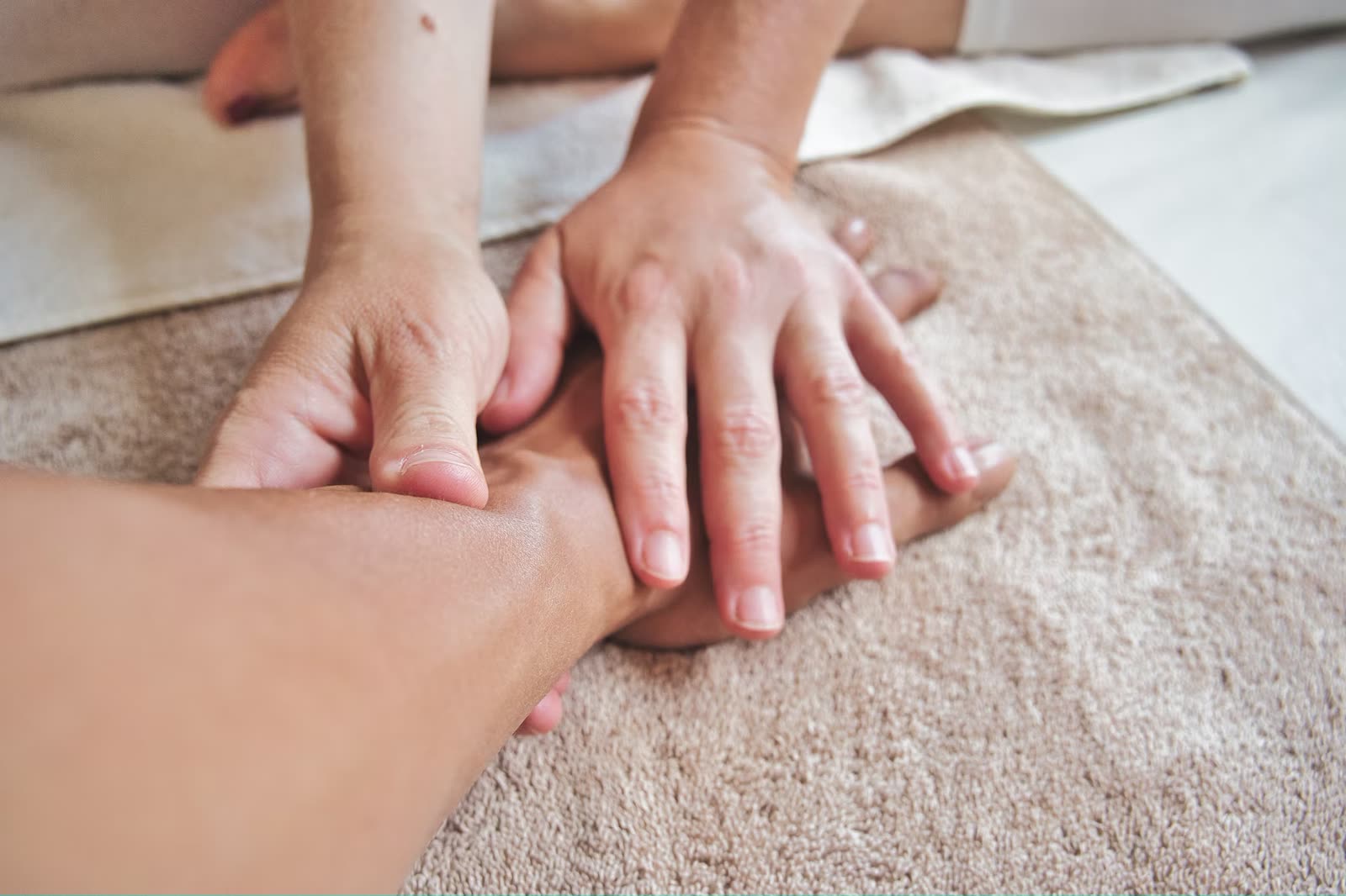 Client relaxing during a stress relief massage treatment in Cheltenham, close up